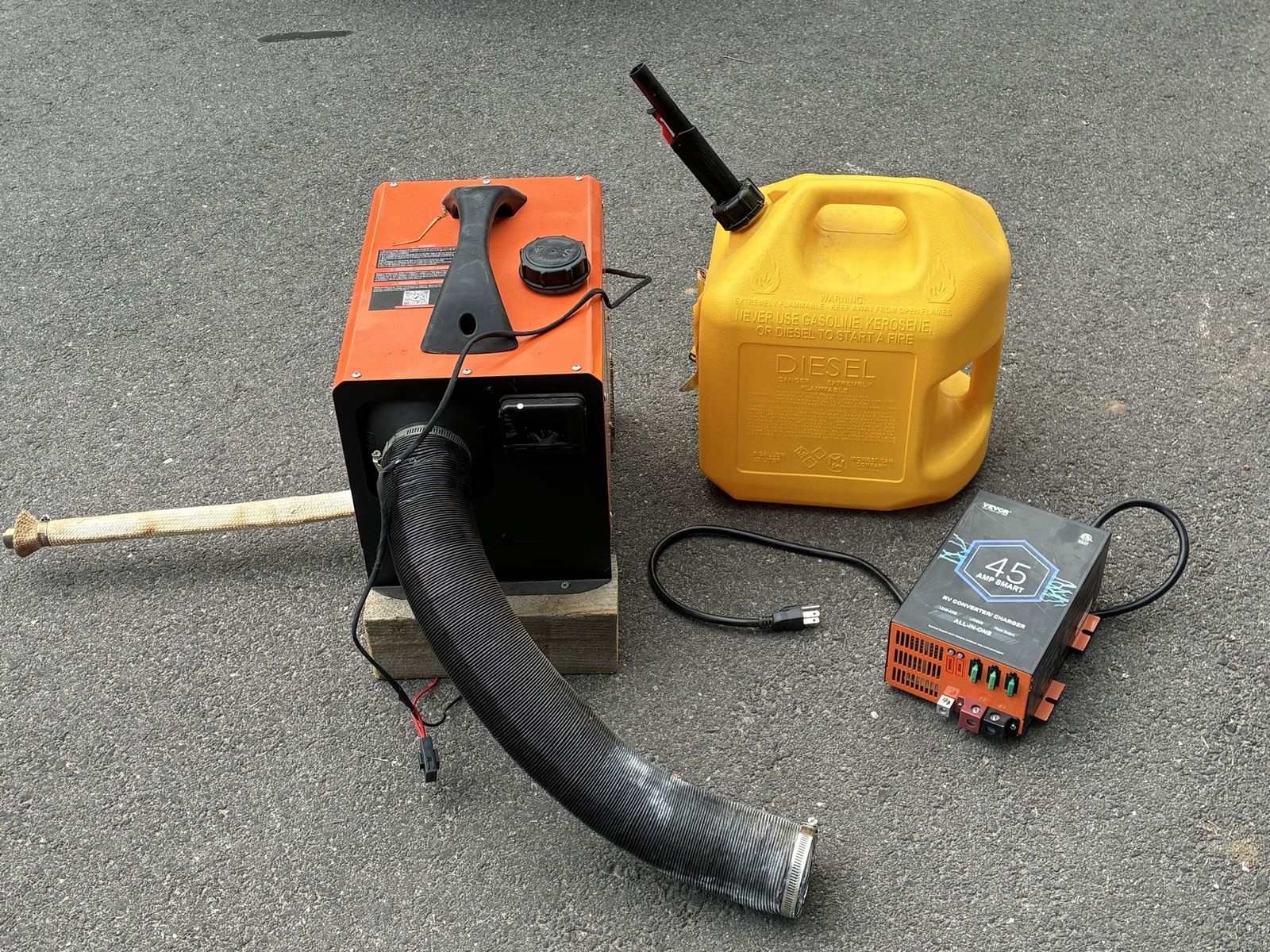 Portable Diesel Air Heater, Fuel Can, and VEVOR 45 Amp Smart RV Converter Charger Setup