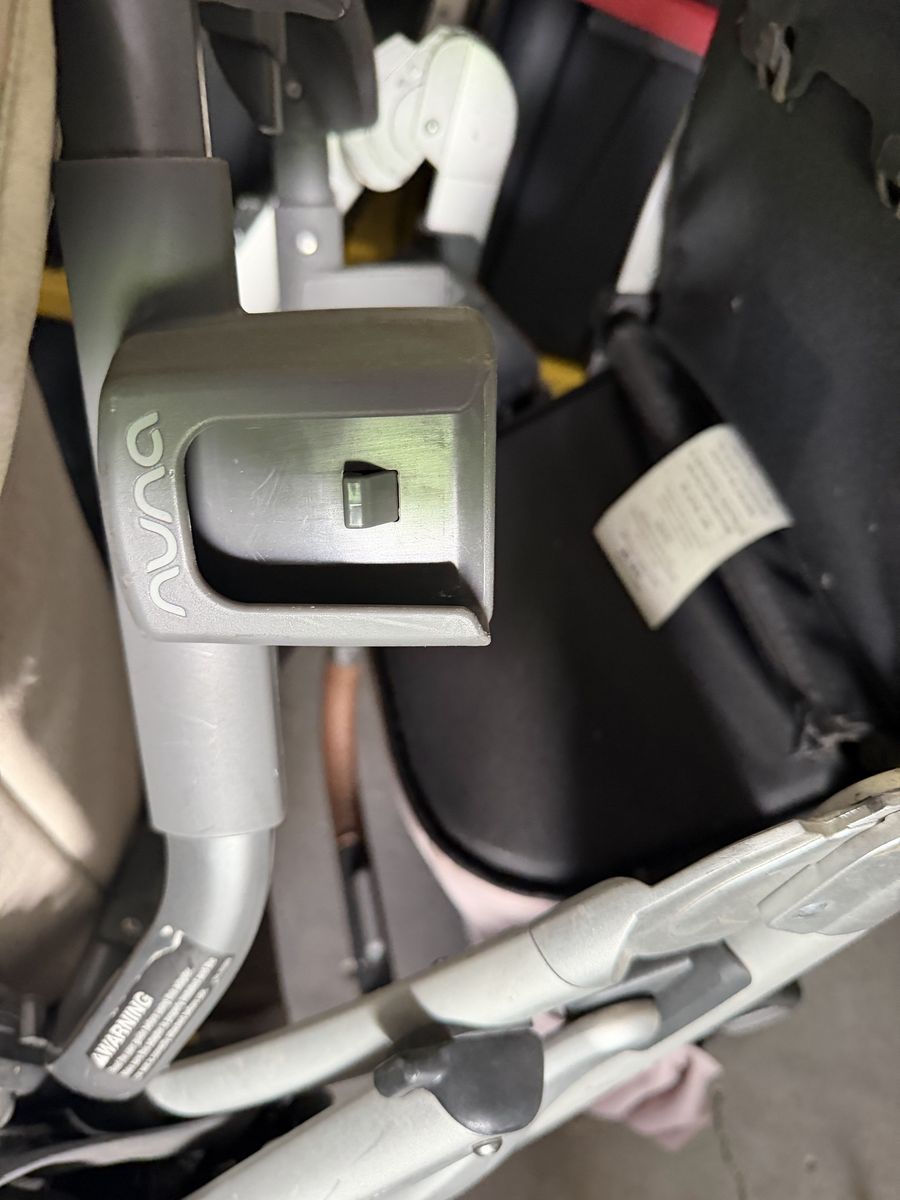 2x baby strollers, with a car seat.