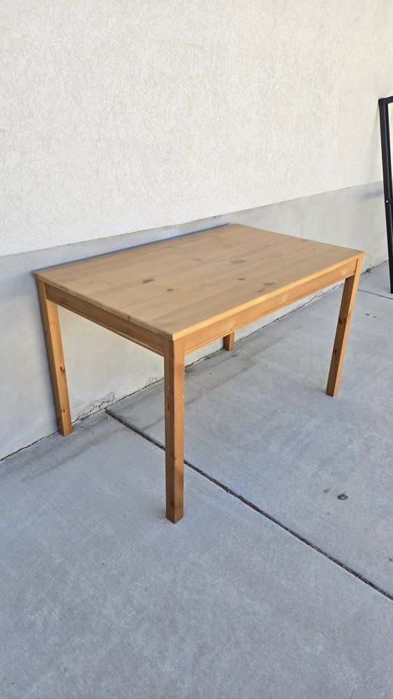 IKEA Pine Wood Dining Table - Solid Wood Construction, Versatile & Durable