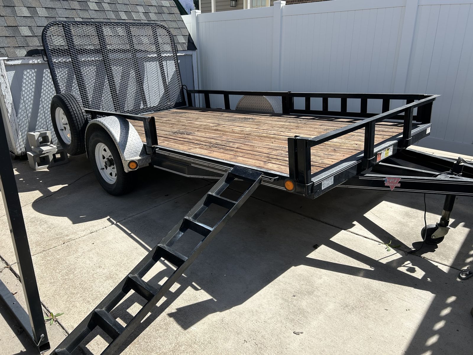 Selling my 2014 P.J. utility trailer. 12' by 6'5"