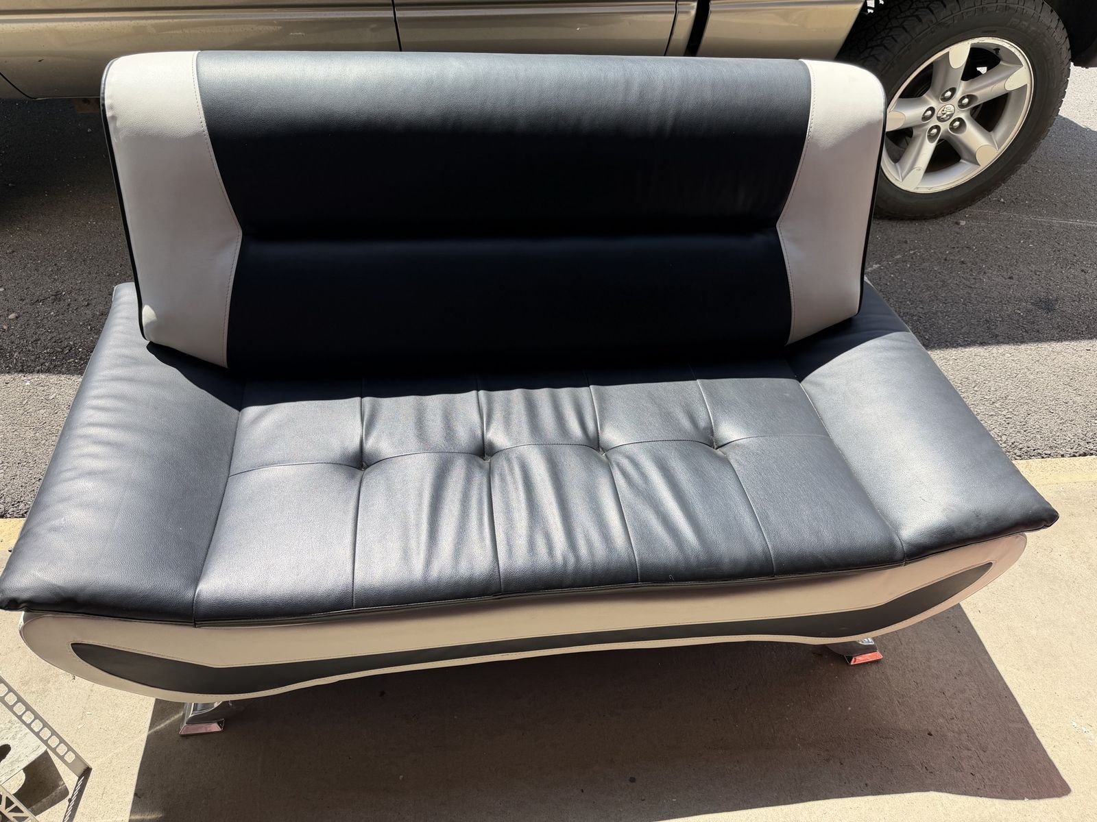 Stylish Black & White Faux Leather Futon Sofa Bed - Modern Design, Versatile Seating