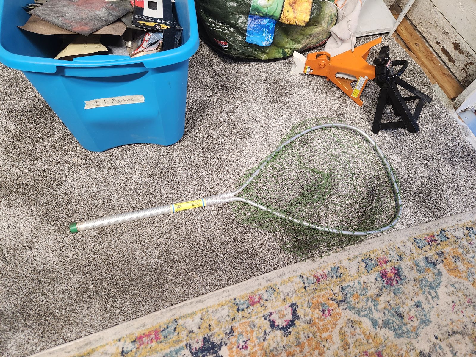 Large long handled fishing net.  No holes.  Works great.  Perfect shape.
