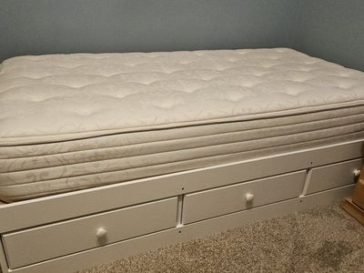Wood Bedframe with Storage Drawers Below.