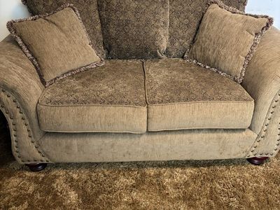 Brown Patterned Fabric Loveseat with Pillows and Nailhead Trim