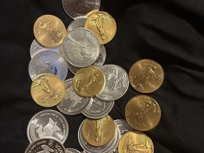 Bullion gold sold at low premium and silver sold at spot !