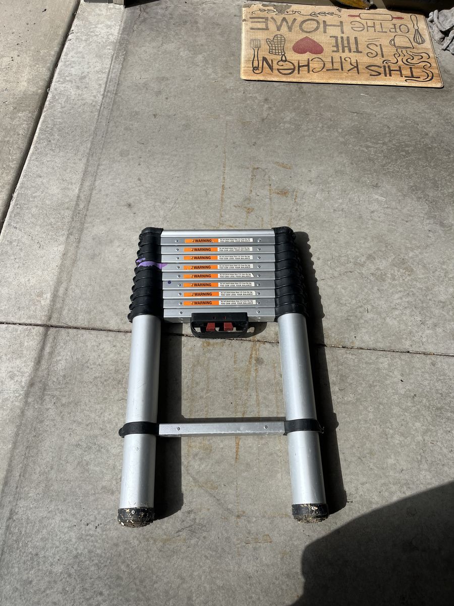 10.7' Telescoping Ladder – $55 OBO