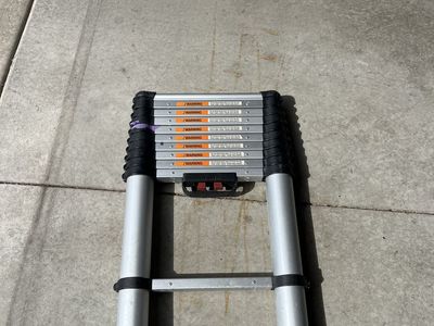 10.7' Telescoping Ladder – $55 OBO