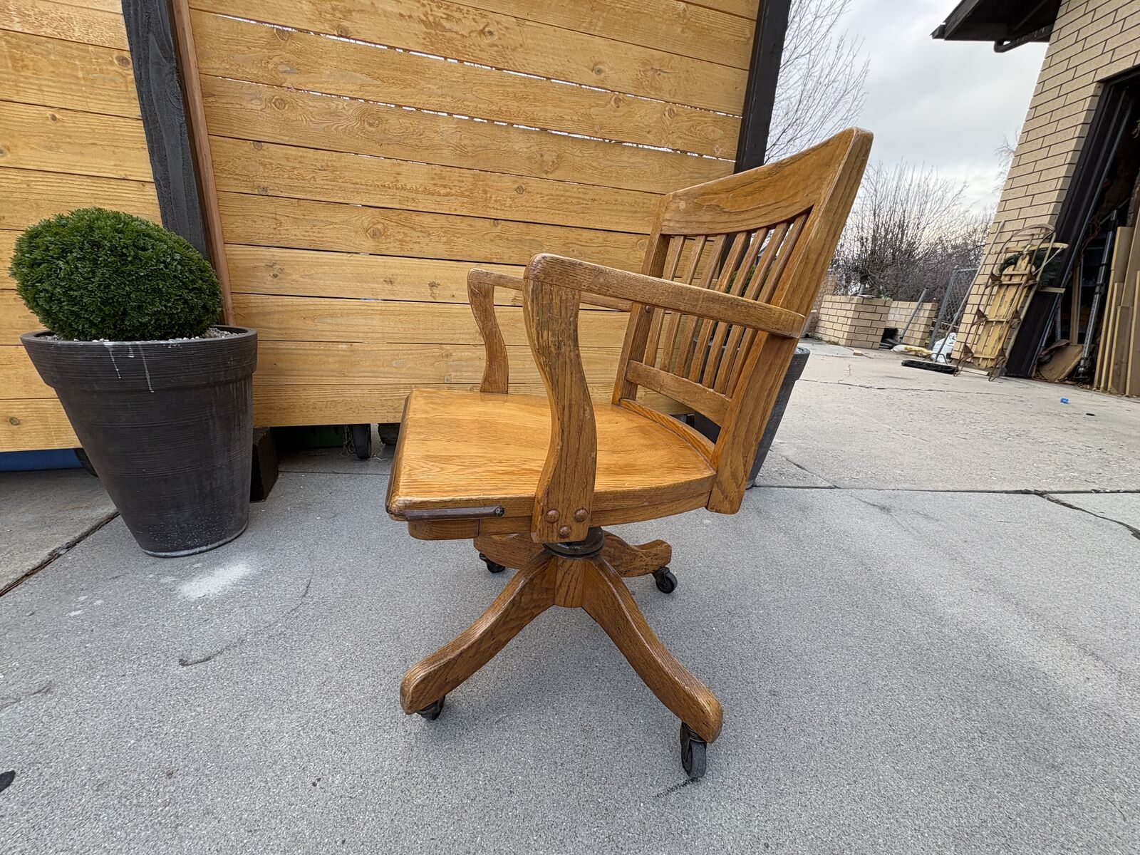 Fantastic antique wooden armchair, rolling swivel reclining desk chair. Bankers / lawyers style chair, vintage Desk chair