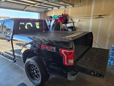 Used Ford Brand aluminum roll up Truck bed cover.