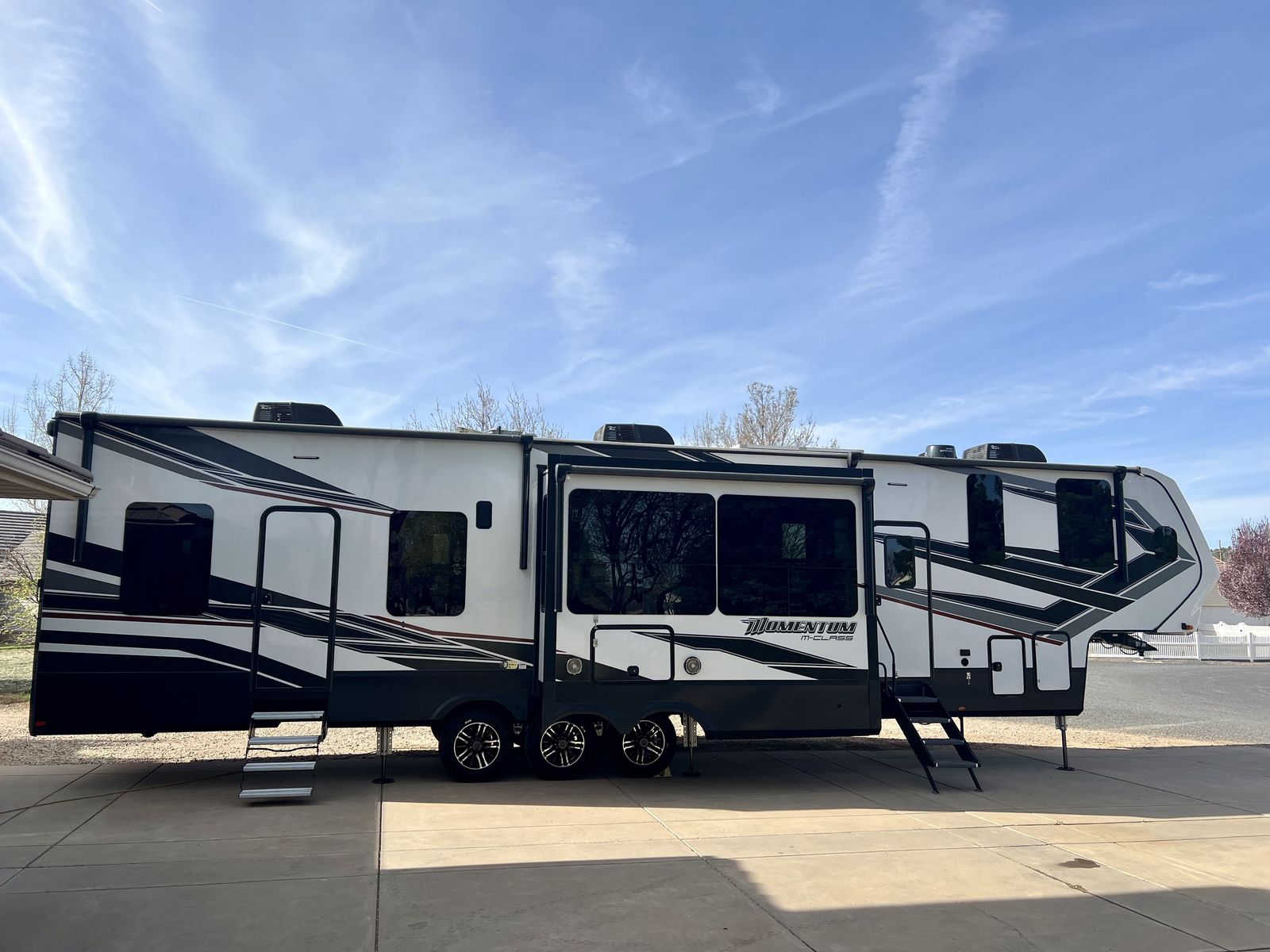 For Sale is a 2022 Grand Design Momentum 395 MS