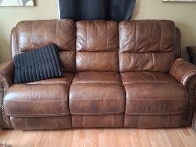 Used Brown Leather Reclining Loveseat with Nailhead Trim