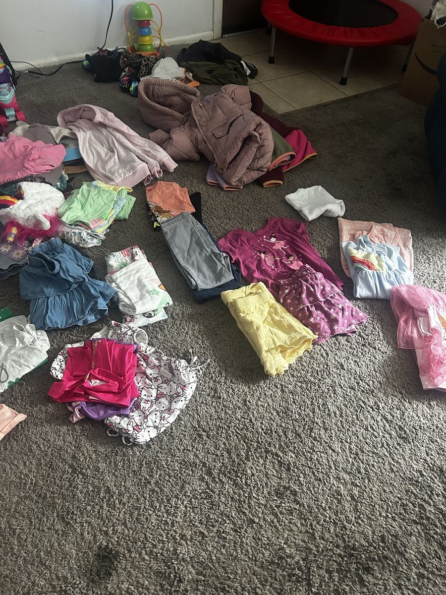Girl clothes ranging from4t up 4/6 shoes, winter jacket I got a few winter clothes, summer clothes, swimming suits