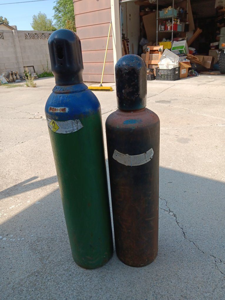 empty oxygen and acetylene tanks 
