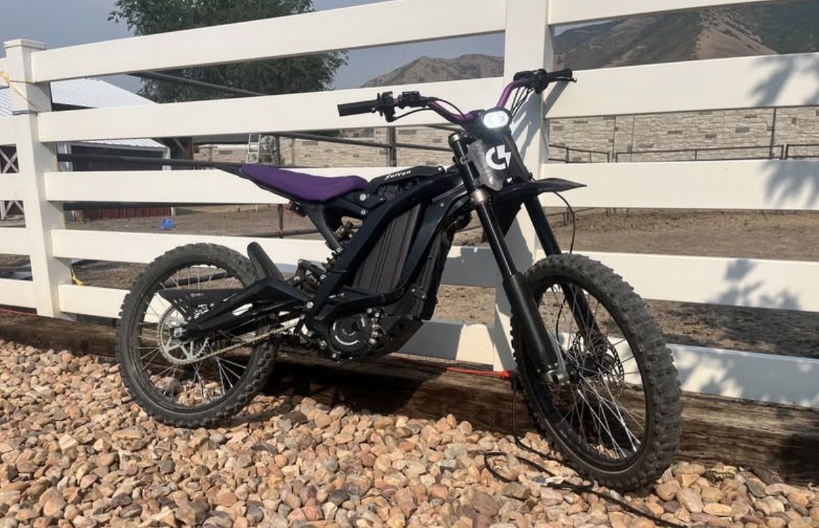 Sur-Ron Electric Dirt Bike Black with Purple Accents Used