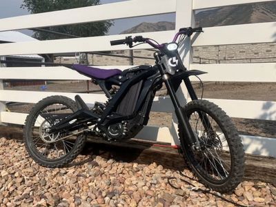 Sur-Ron Electric Dirt Bike Black with Purple Accents Used