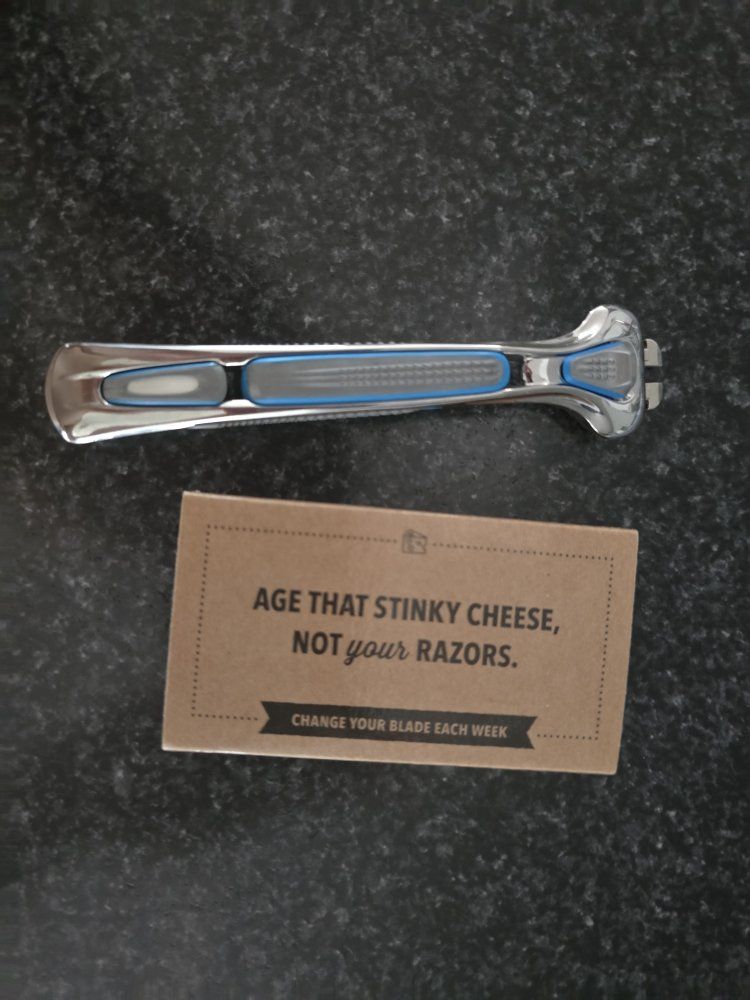 New Dollar Shave Club Chrome Razor Handle with 4 v
blades 
