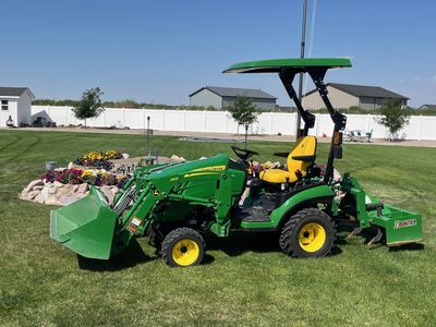 John Deere 1025R Tractor w/ Loader, Front Blade, Box Scraper, Rotary Mower, Tiller, i-hitch