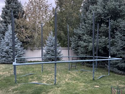 Large Outdoor Rectangular Trampoline Metal Frame with Enclosure Poles and Access Ladder pad springs in storage bought new $2800