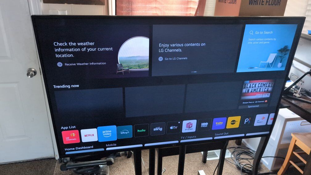 55 inch 4k TV mounted on mobile stand
