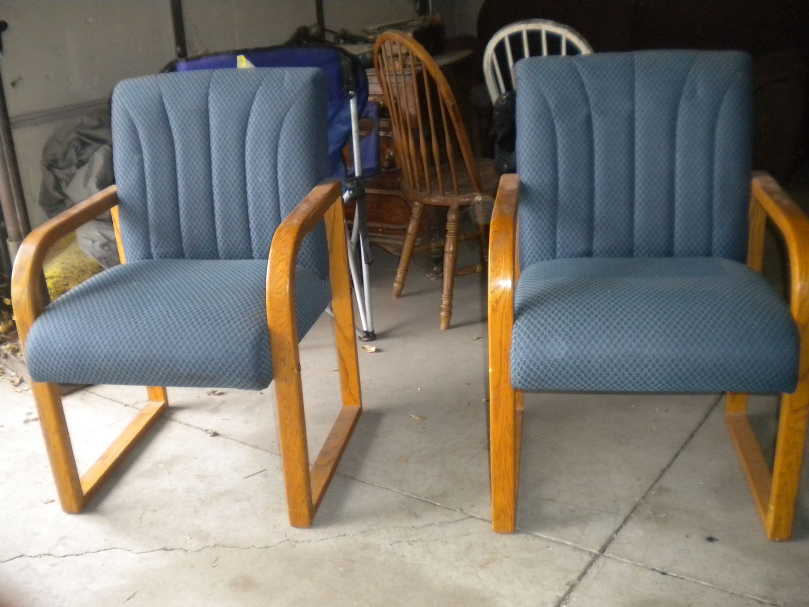 Two Blue Upholstered Armchairs with Wood Frames