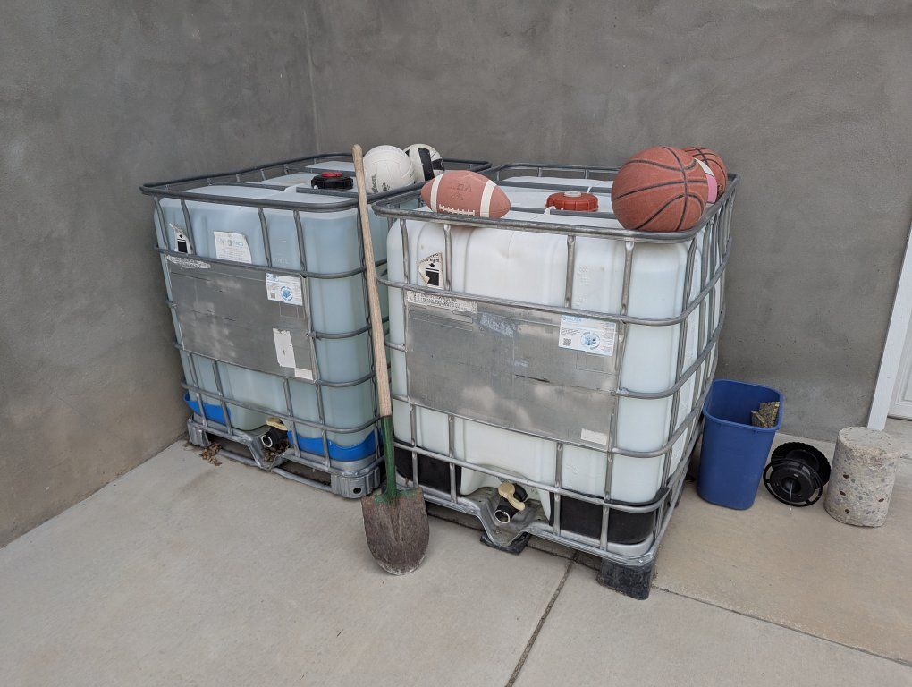 Pair of Used 250 Gallon Water (liquid) Storage Tanks