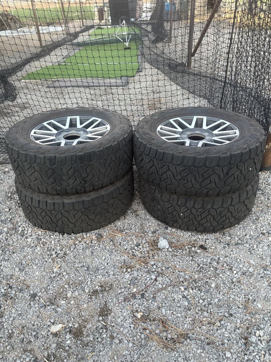 Nitto Recon Grappler A/T Tires on 20" Wheels - 35X12.50R20LT Set of 4