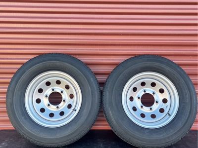 Set of 2 Free Country 225/75 R15 Heavy Duty 10 Ply E Load Trailer Tires Mounted on New Silver Wheels Six Lug Pattern