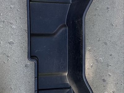Rear seat storage bin