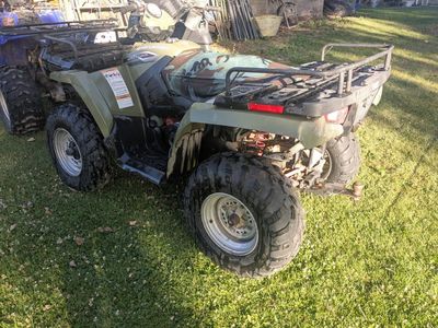 Polaris Sportsman 500 HO EFI ATV 4x4 with Camo Seat and Gun Boot - Green