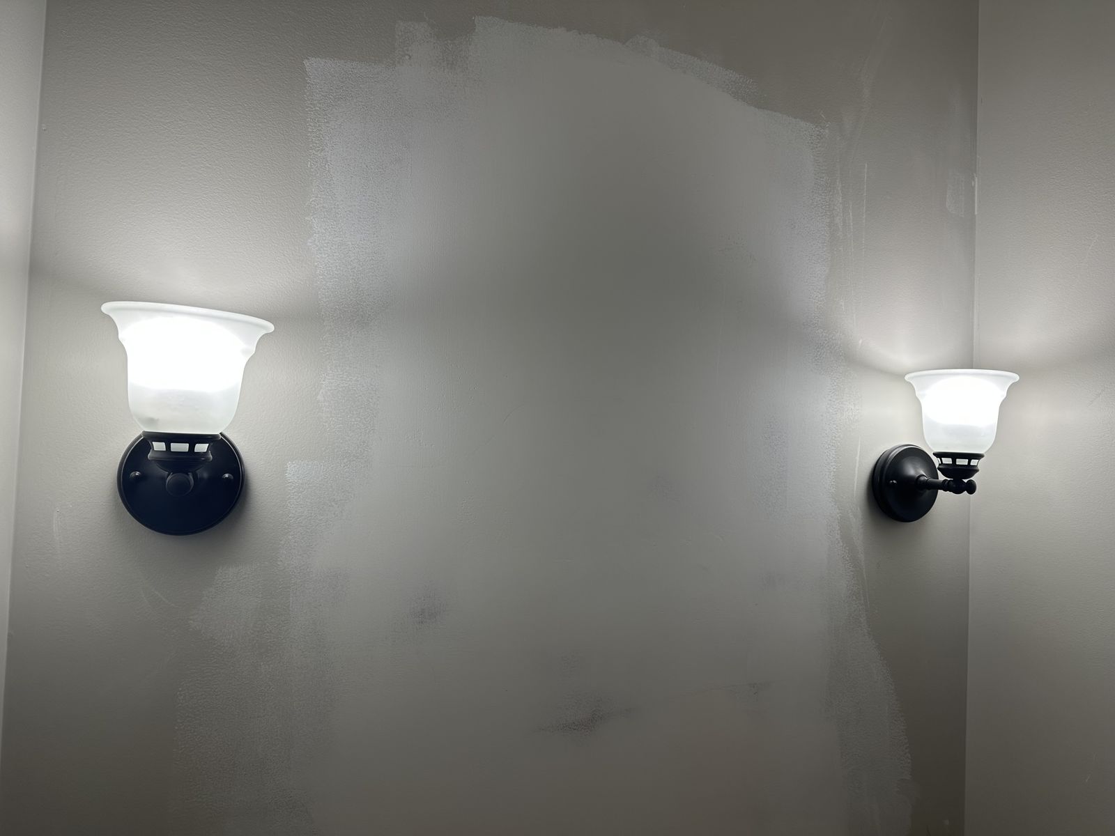 Pair of Oil Rubbed Bronze Wall Sconces with Frosted Glass Shades