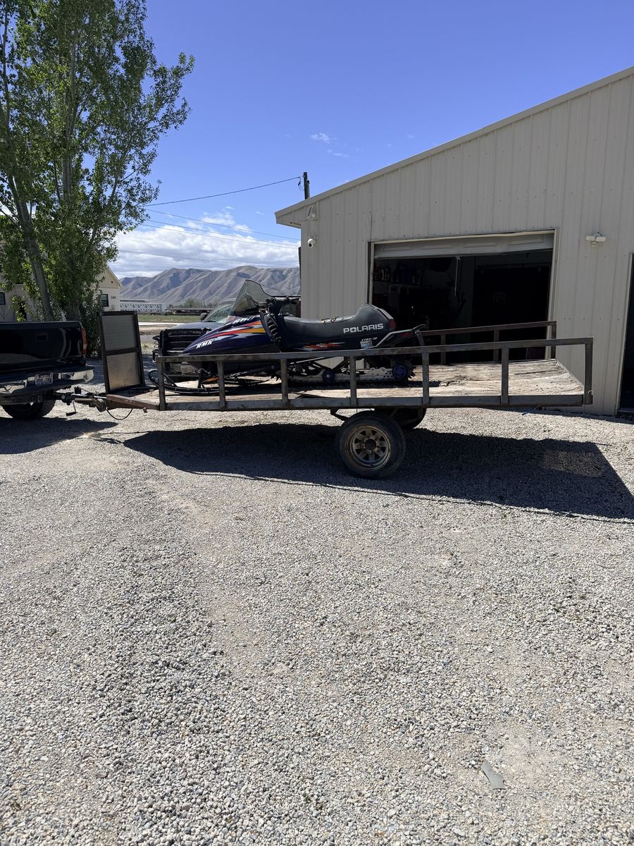 Snowmobile and trailer