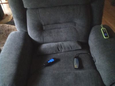 Recliner with heat and massage. Still in box. Can't have my dog.