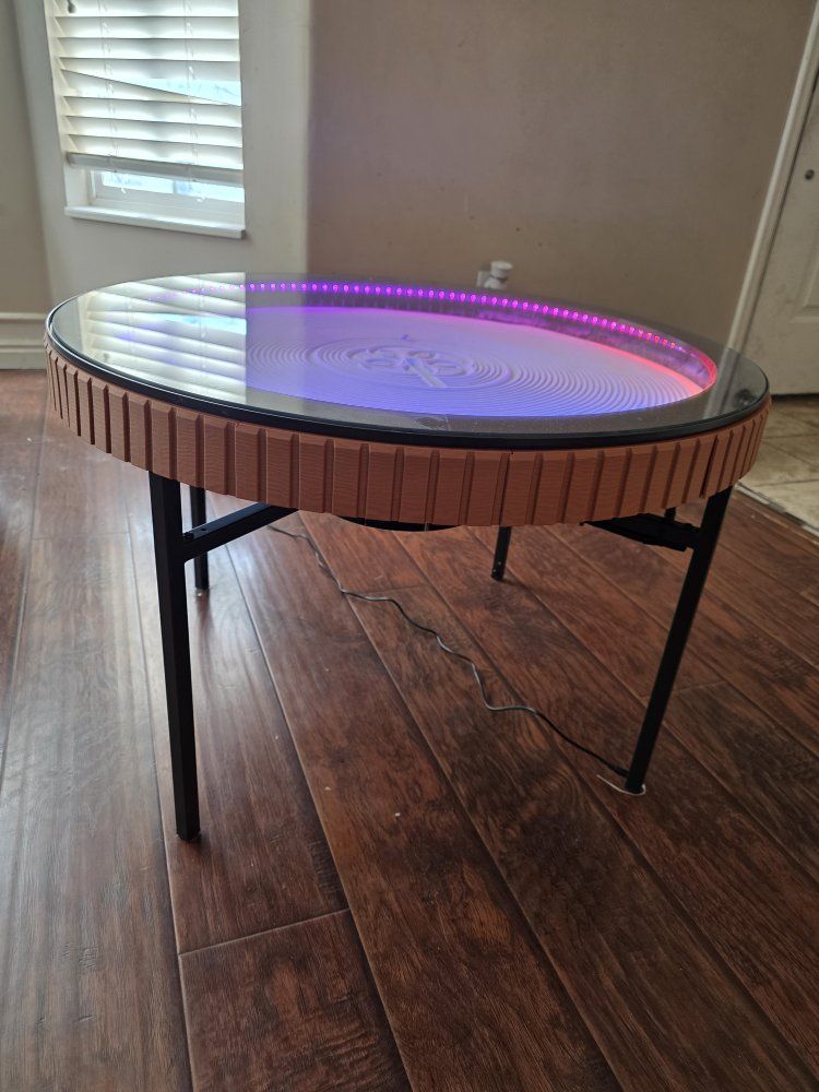 Kinetic sand art coffee table.