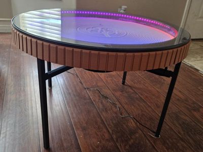 Kinetic sand art coffee table.