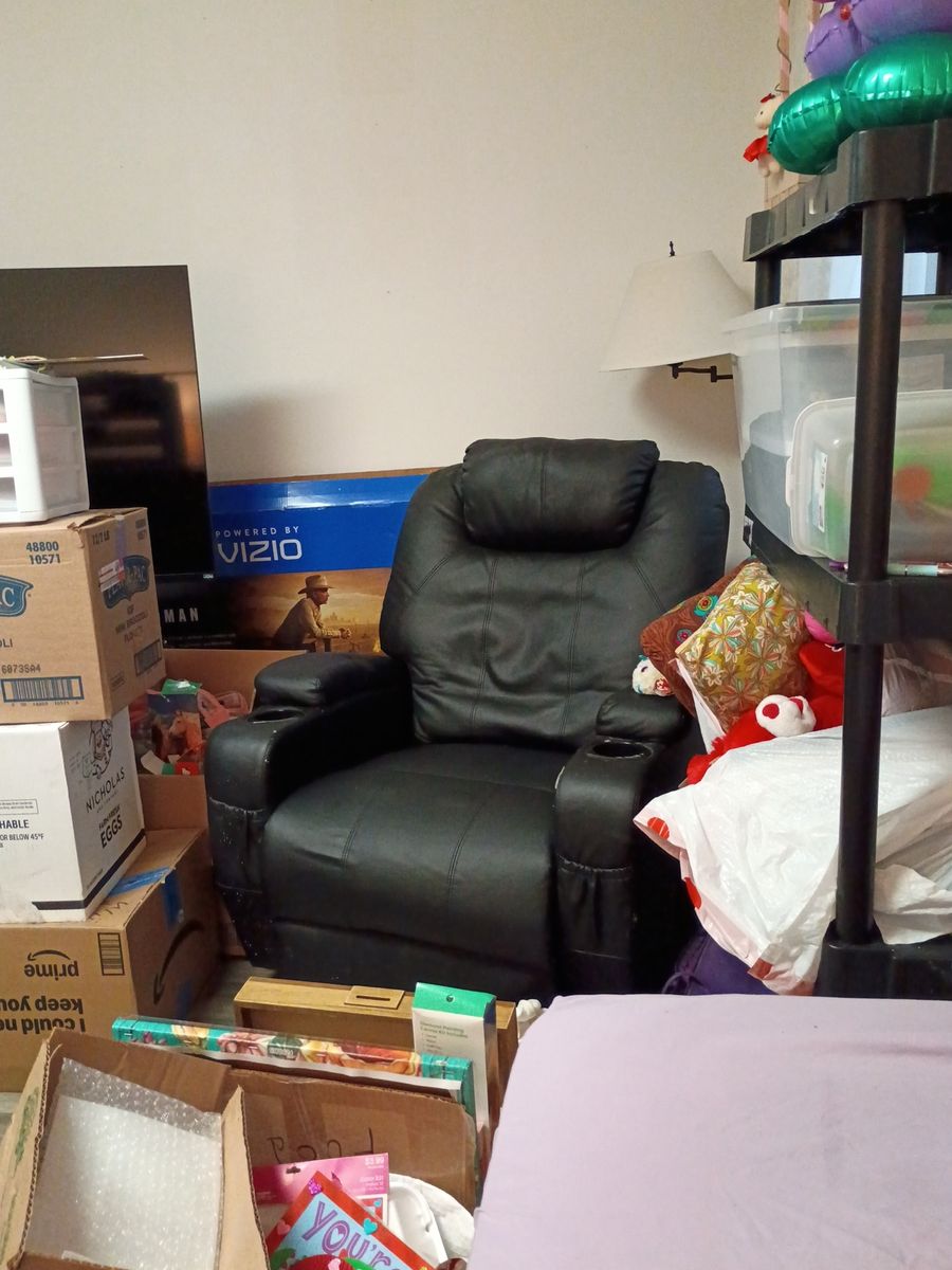 Black leather recliner chair