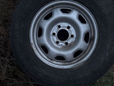 Four wheels 17 inch six bolt pattern off of F150 with tires that have about 10 to 15,000 more miles available