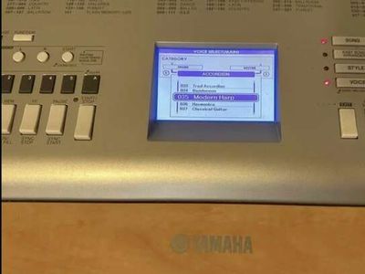 Yamaha YPG-635 88-Key Weighted Portable Grand Piano/ keyboard with AC adapter, music holder, and stand.