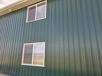 48 panels of green tin 15ft 8in