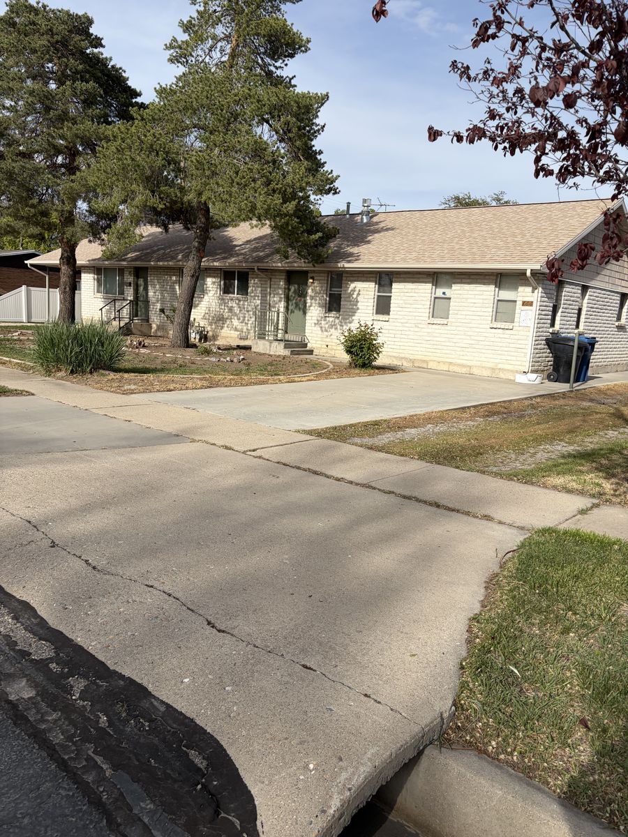 Duplex with large shop for sale