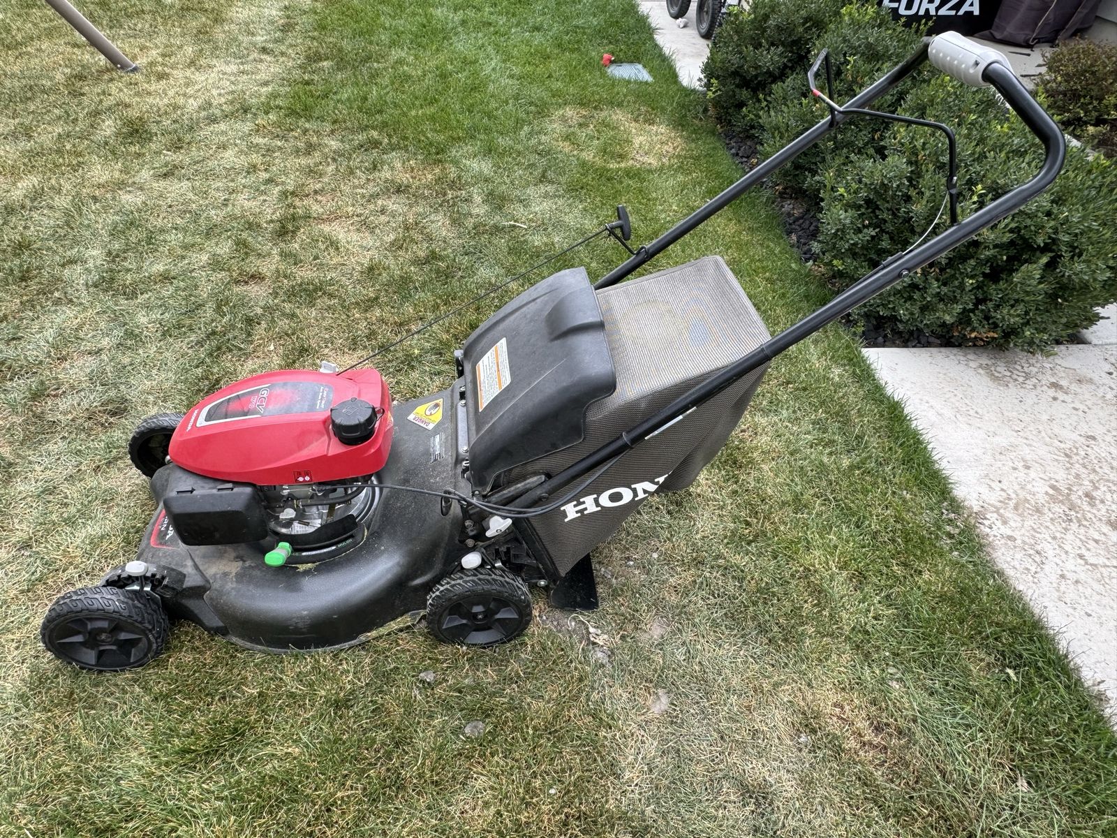 Honda HRN 216 Self-Propelled Lawn Mower – $300
