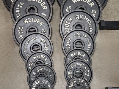 253 pounds of Olympic weights