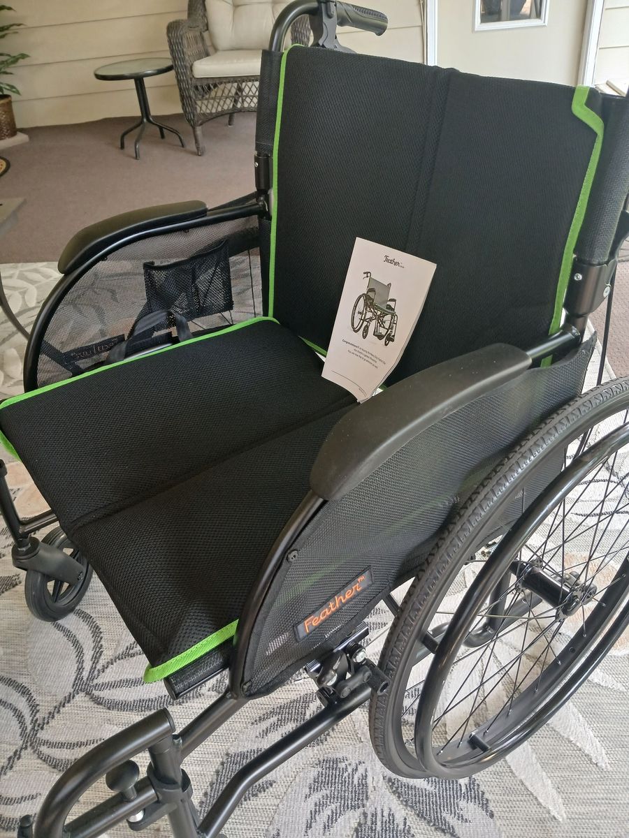 Feather Chair Ultra Lightweight Folding Wheelchair with Green Trim