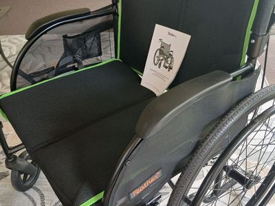 Feather Chair Ultra Lightweight Folding Wheelchair with Green Trim