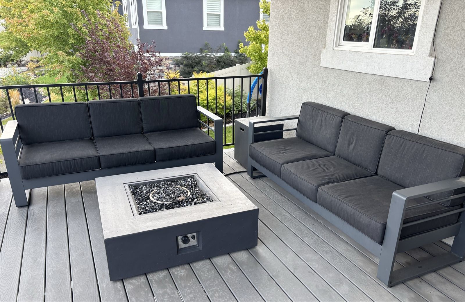 Modern Outdoor Patio Set with Two Sofas and Concrete Fire Pit Table