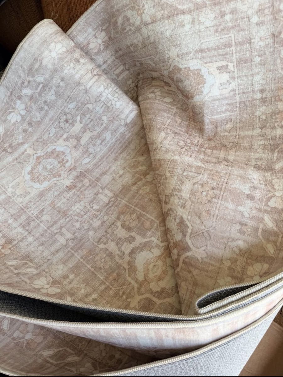 New. Beautiful 9 x 12 mocha washable area rug.