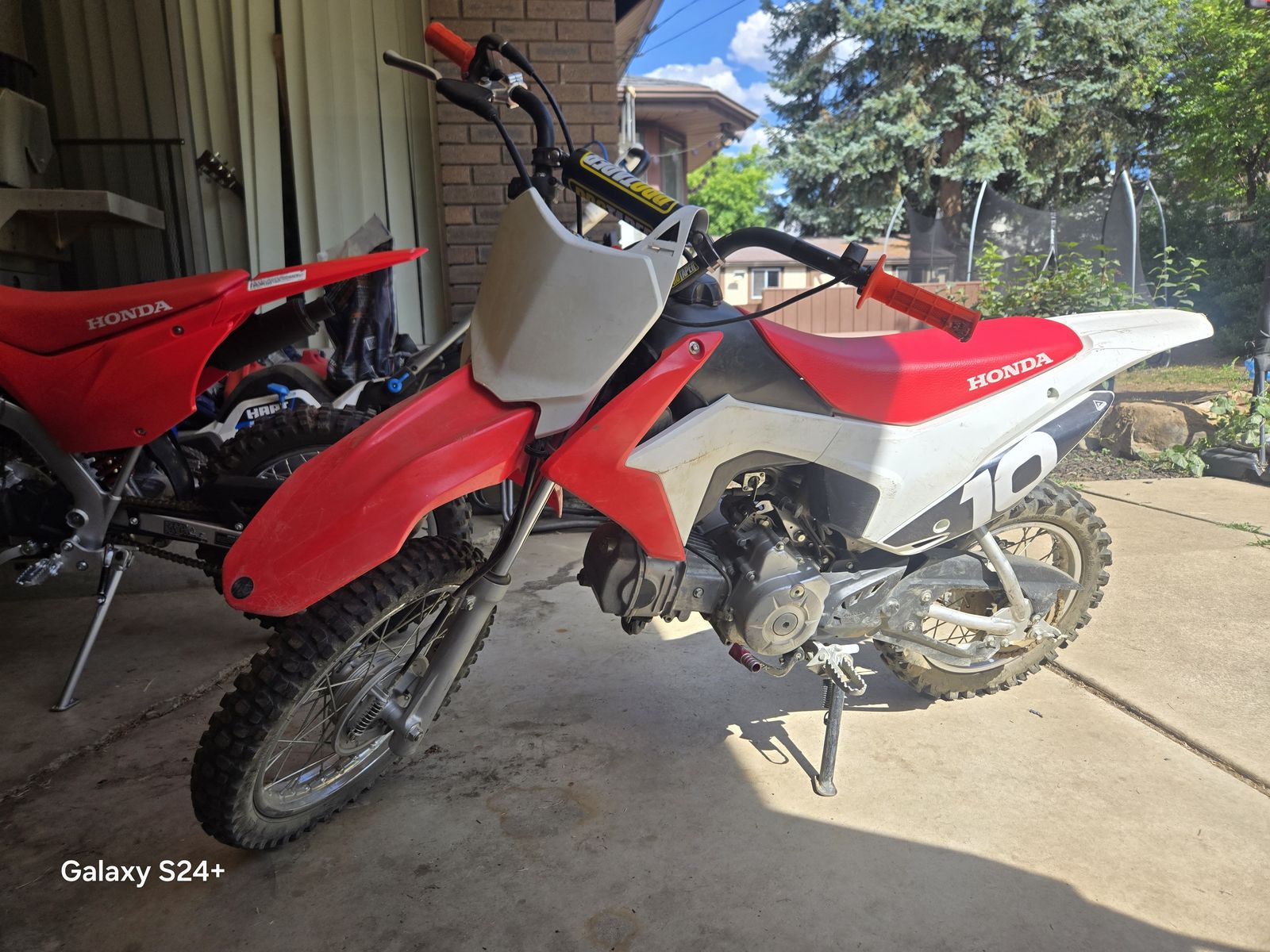 Honda CRF110 Dirt Bike - Red & White, Youth Off-Road Motorcycle