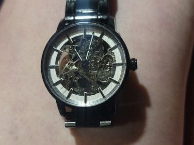 kenneth Cole self winding automatic mechanical movement requires no batteries