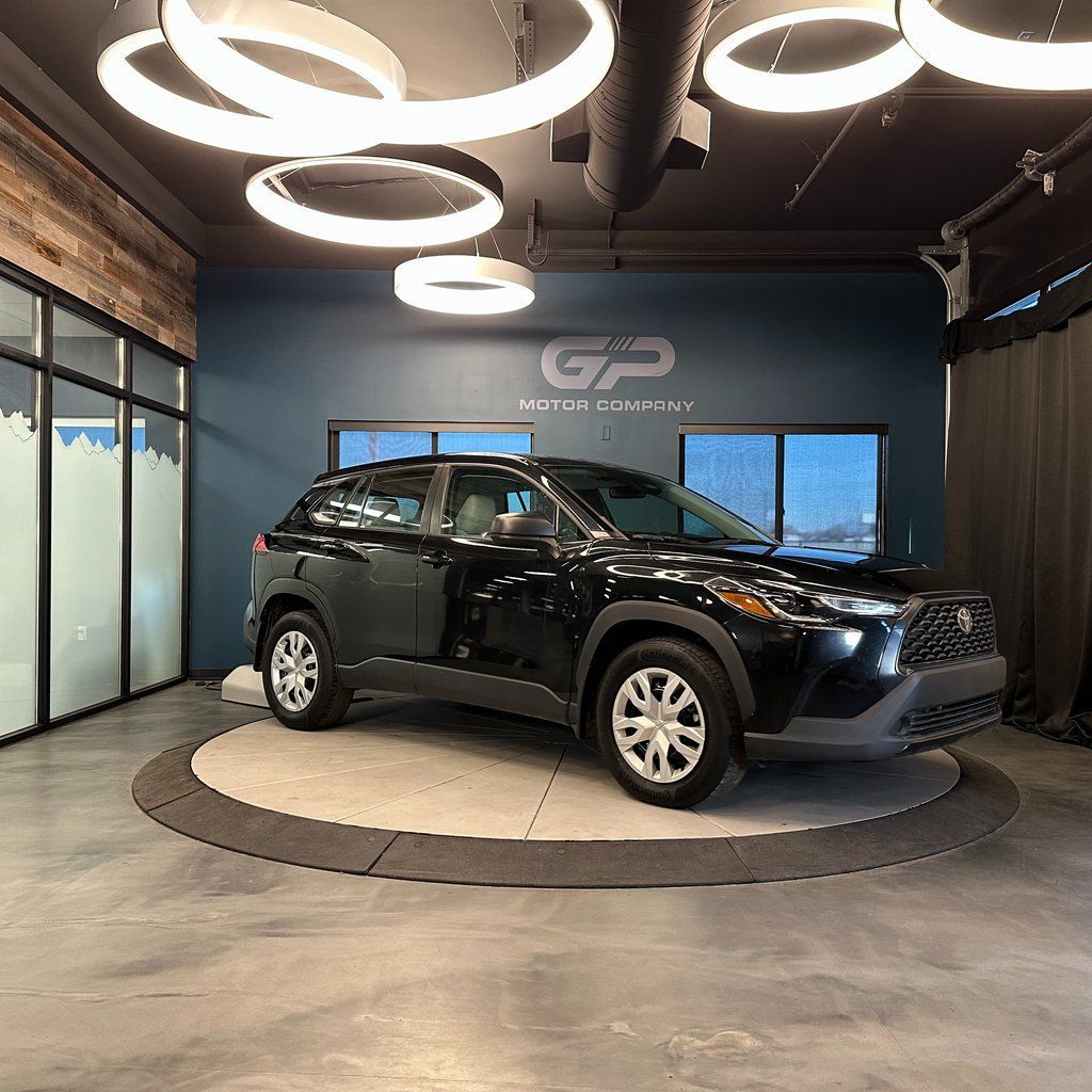 2023 Toyota Corolla Cross L — rebuilt & branded title, 10% below market