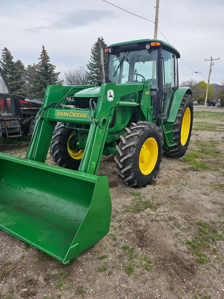 John Deere 6115