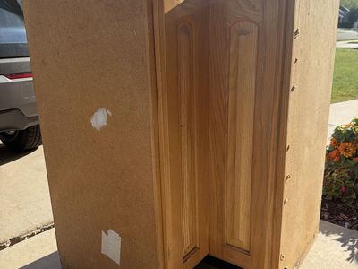 Oak Corner Base Cabinet with Rotating Lazy Susan Shelves. Perfect for a garage.